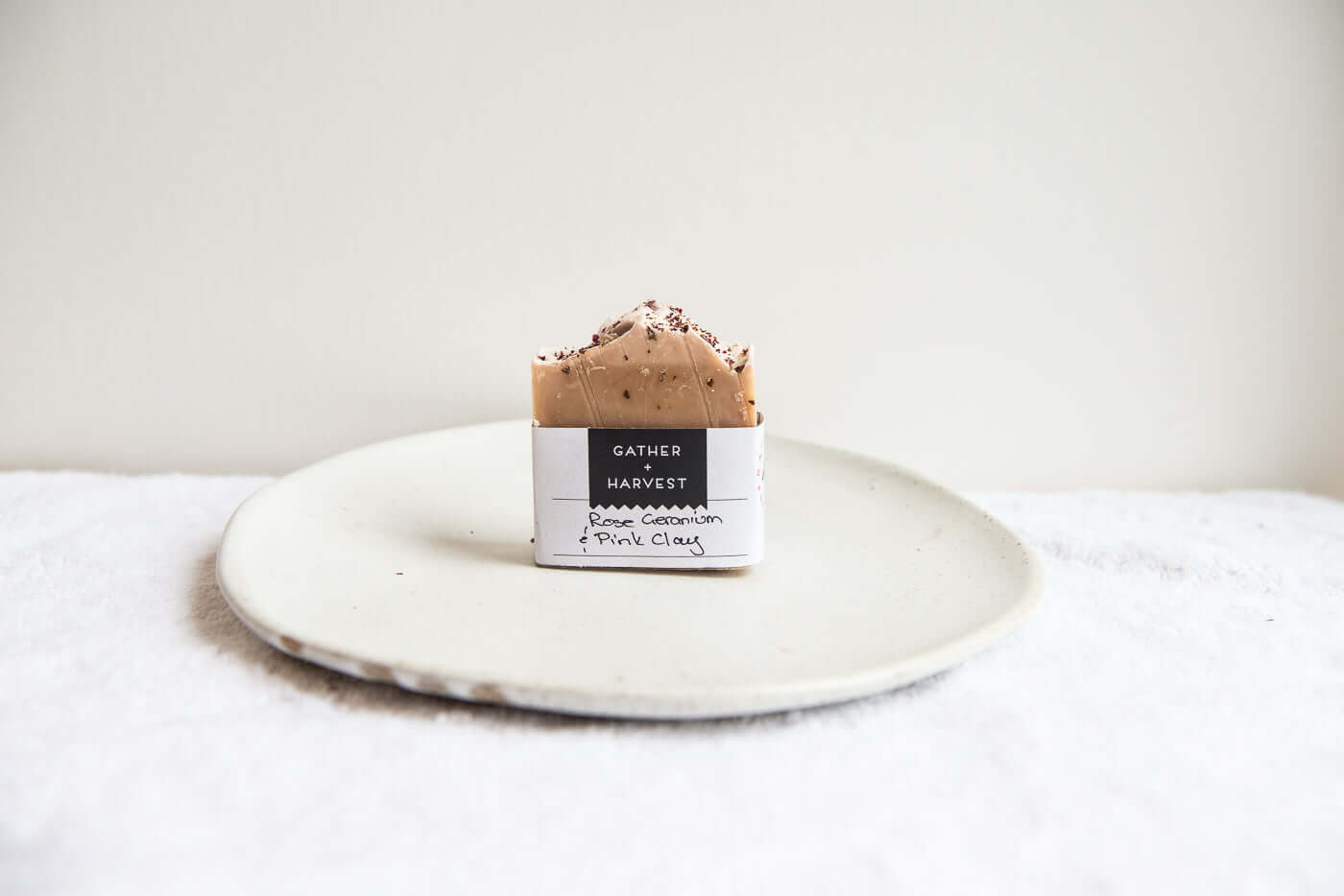 This handmade natural soap with Rose Geranium, Ylang Ylang & Australian Red Clay Soap deeply nourishes your skin