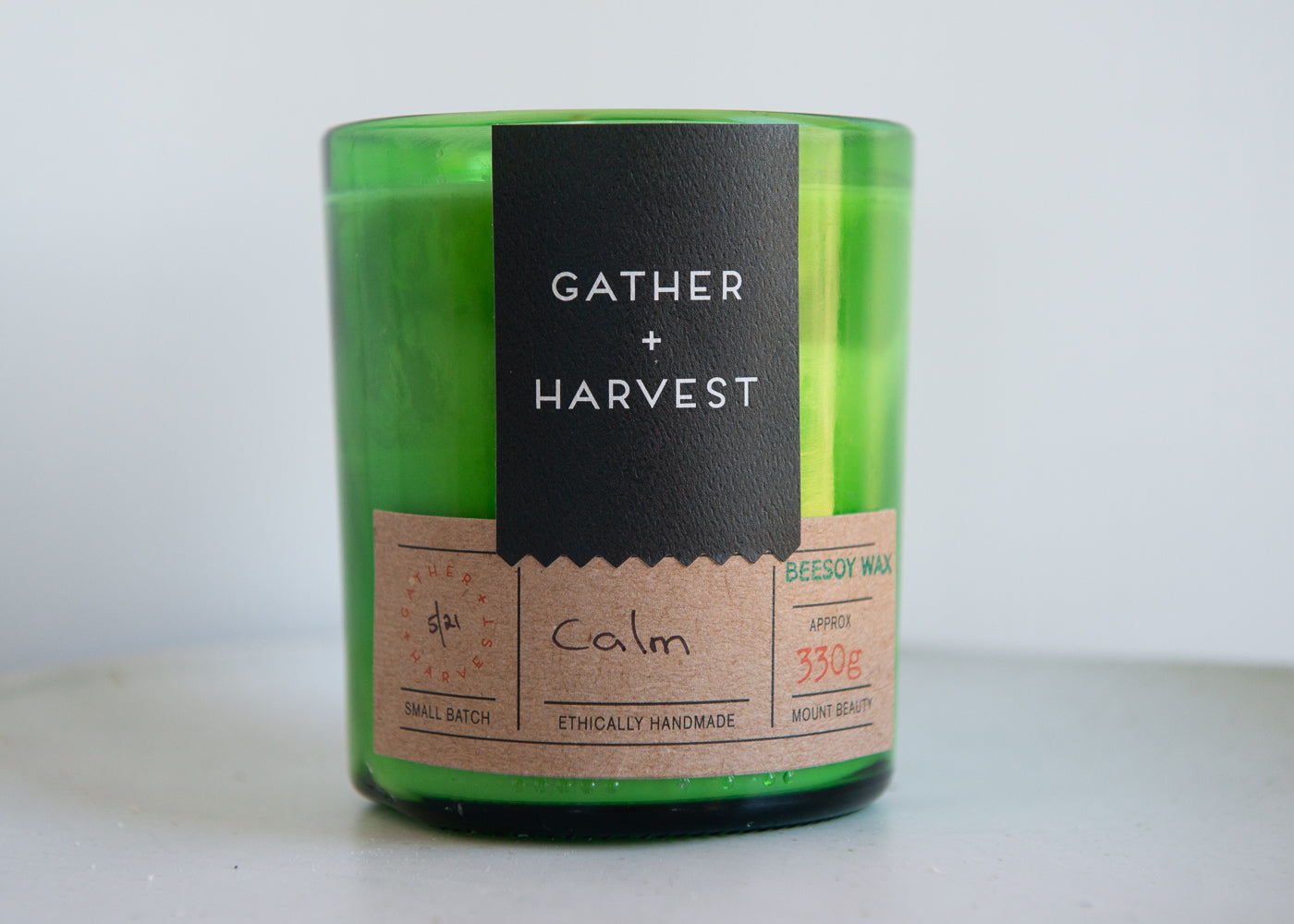 This handmade BeeSoy Candle in Calm scent is ethically made in the Gather + Harvest Studio
