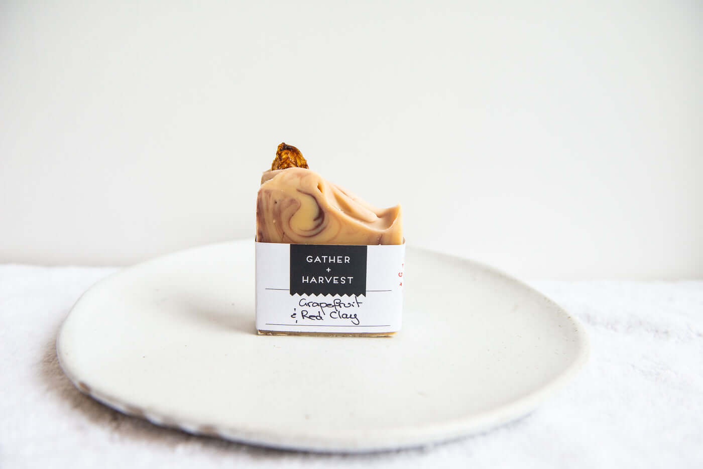This handmade natural soap with Grapefruit & Australian Pink Clay Soap deeply nourishes your skin